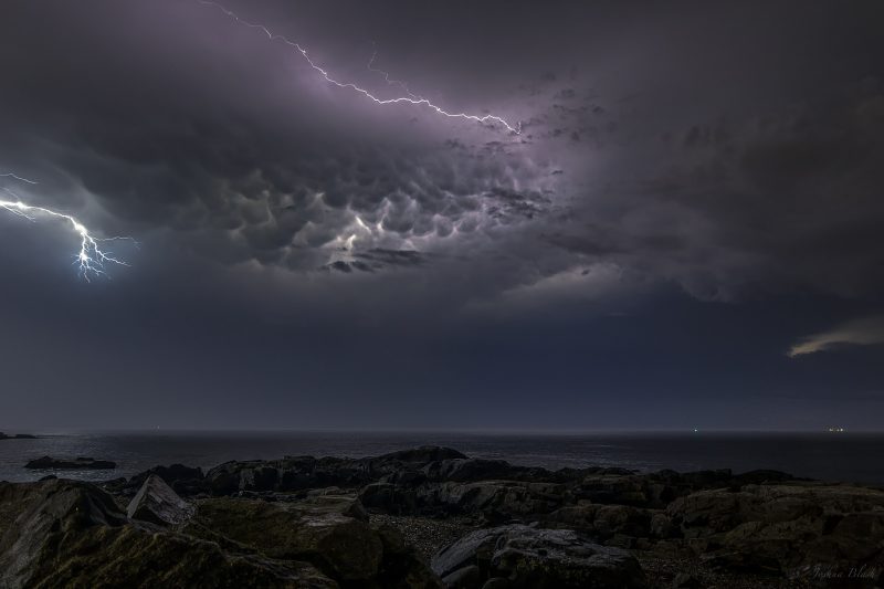Josh-Blash-caught-these-mammtus-clouds-illuminated-by-lightning-over-Rye-New-Hampshire